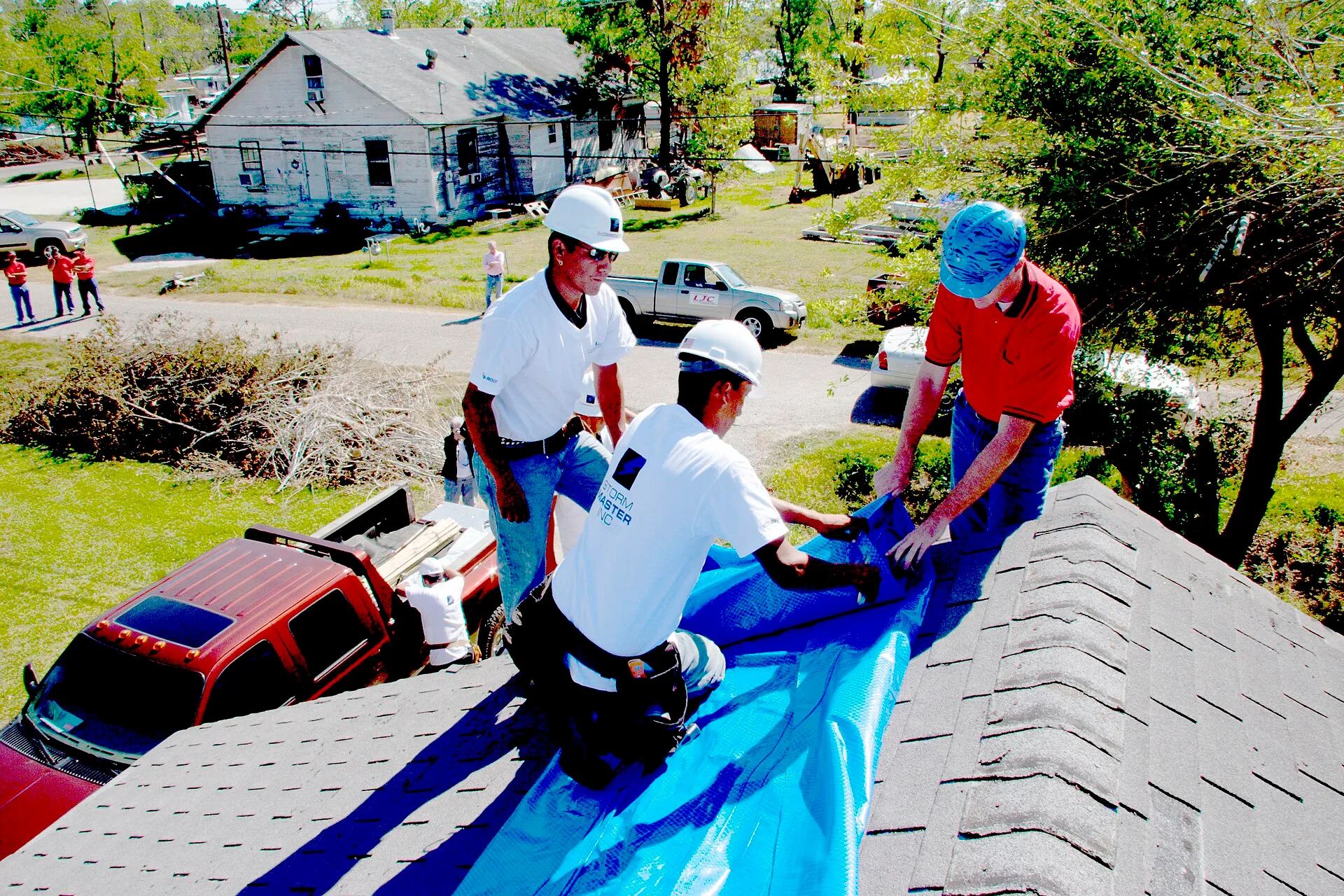 Port Arthur, TX, October 29, 2005 -- Crews attach blue vinyl roofing to a damaged roof. FEMA provides funds for the "blue roof" program. Photo by Ed Edahl/FEMA. What to measure every month in a roofing contractor business for 2027